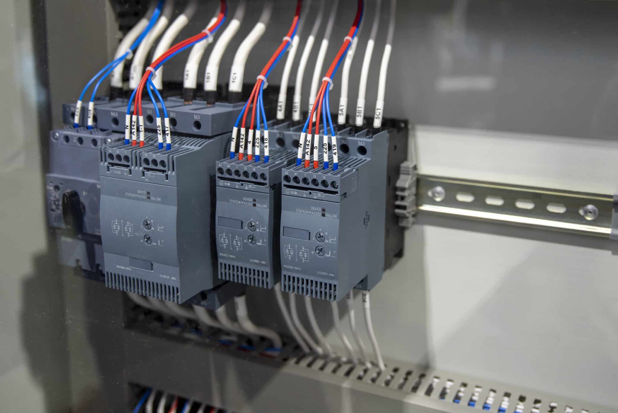 Phase control relay and intermediate relays in electrical cabinet, Lighting contactor wiring.